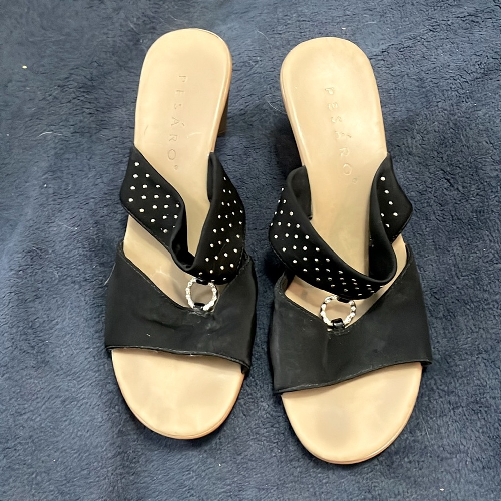 black heels size seven a bit worn.